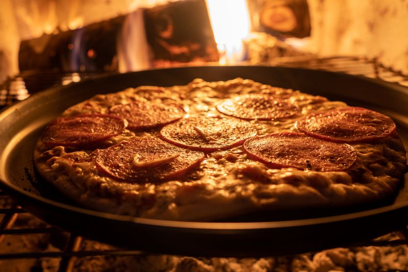 Stone-fired oven at Pizza inn kitchen
